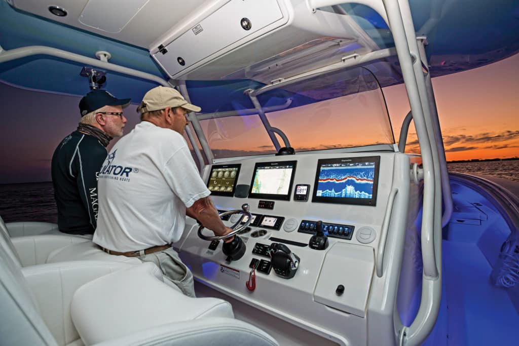 Fishermen at the helm