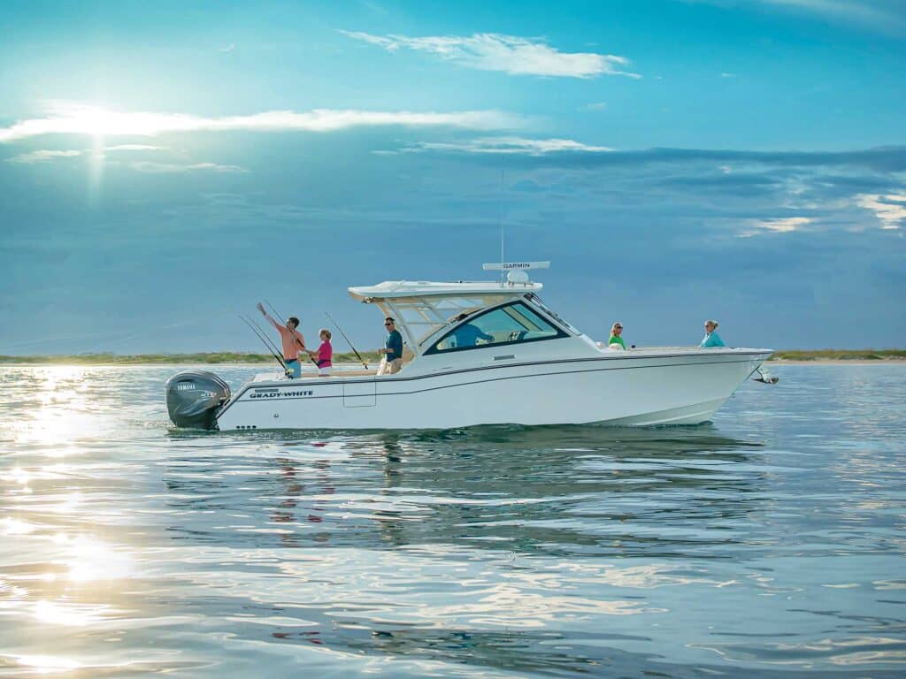 A family out fishing on a dual-console