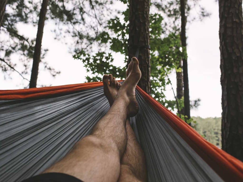 Man relaxing on a hammock