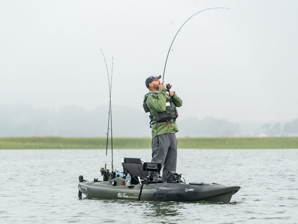 fighting a fish from a kayak