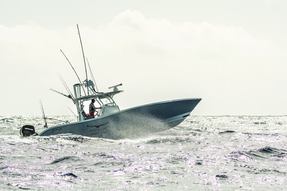 A center console boat runs upsea in choppy conditions