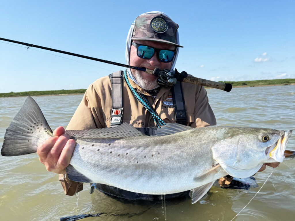 Capt. Charlie Paradoski holds a nice seatrout caught on the Texas flats.